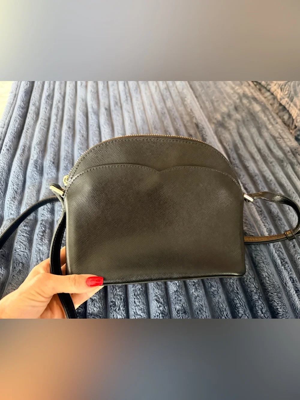 Kate Spade New York Payton Dome Crossbody in black saffiano leather.